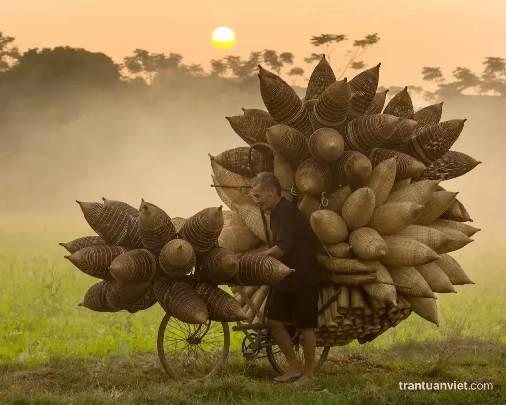Farmer with full bike of fishing basket, Hung Yen NG041