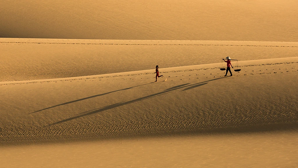 Mother and daughter on sanddune, VN015